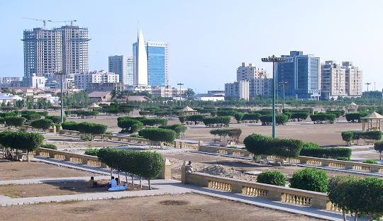 Karachi skyline at sunset with Arabian Sea coastline